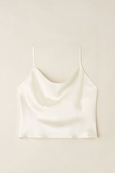 Silk satin crop camisole with soft cowl neckline that folds in front. Ideal to wear with high rise skirts or pants.
The model is 5’ 9” (175 cm) tall and is wearing a size S.

The silk in this piece is bluesign® certified. Chic Crop Top Camisole With Built-in Bra, Elegant Solid Tops For Loungewear, Elegant Tank Crop Top For Spring, Elegant Spring Tank Crop Top, Elegant Tank Crop Top, Elegant Cropped Tank Top For Spring, Elegant Cropped Top For Loungewear, Chic Cropped Tank Top For Loungewear, Spring Satin Loungewear Top