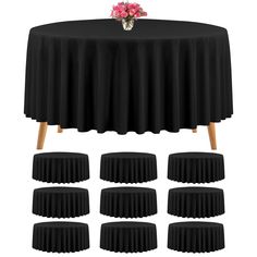 black round tablecloths with wooden legs and flower centerpiece on top, set of 6