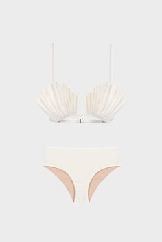 The classic and elegant coquillage high-waisted bikini, a desired piece from the LA MER collection, includes a shell top detail. The high-waist feature textured lycra, giving this piece even greater charm. Pair the La Mer coquillage high-waisted bikini top with pants or skirts, and flat sandals for your next destination. Fit Small fit. We recommend buying one size bigger than your usual size. Composition 85% Polyamide 15% Spandex Made in Brazil This item is final sale Classy Swimwear, Shell Bra, Top With Pants, Adriana Degreas, Ibiza Outfits, White Bikinis, Shell Top, Shell Tops, Swim Swim