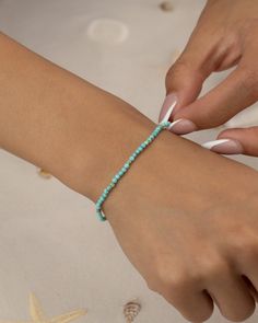 Buy individually or 'Shop the Stack'. 🌴  buy 2 or more | use Coupon Code STACK for 25% off your purchase! 🌴  buy 5 or more | use Coupon Code STACKMORE for 30% off your purchase! Minimalist genuine turquoise beaded bracelet or anklet handmade in your choice of length. These beautiful bracelets and anklets are hand-strung on high-quality stretch cord. A beautiful pop of color to wear on its own or layered with your favorite jewelry. Buy just the turquoise or select our 'SHOP THE STACK'. *Water-r Flexible Bracelets With Tiny Beads As A Gift, Gift Stretch Bracelet With Tiny Beads, Turquoise Beaded Bracelets For Everyday Wear, Everyday Turquoise Beaded Bracelets, Everyday Turquoise Beaded Bracelet, Dainty Hypoallergenic Stretch Bracelet For Friendship, Hypoallergenic Flexible Beaded Bracelets, Flexible Hypoallergenic Beaded Bracelets, Adjustable Dainty Stretch Bracelet