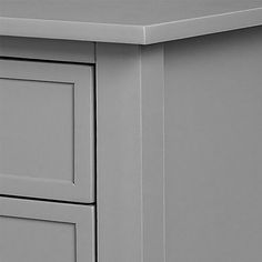 a gray cabinet with two doors and drawers