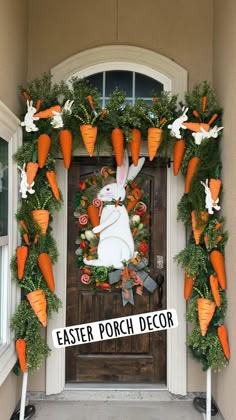 a door decorated with carrots and bunny ears