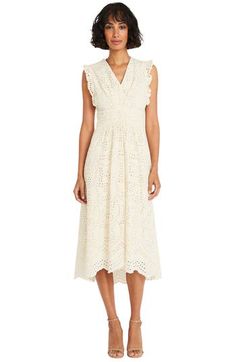 Dainty ruffles frame a breezy cotton embroidered-eyelet midi dress fashioned with a gently gathered waist and sweetly scalloped high-low hem. 45" to 48" length (size 8) Hidden back-zip closure V-neck Sleeveless Partially lined 100% cotton Hand wash, dry flat Imported Feminine Sleeveless Midi Dress With Broderie Anglaise, Sleeveless Broderie Anglaise Midi Dress For Garden Party, Sleeveless Eyelet Midi Dress, Elegant Sleeveless Eyelet Midi Dress, Sleeveless Broderie Anglaise Midi Dress For Daywear, Spring Sleeveless Eyelet Midi Dress, Sleeveless Eyelet Midi Dress For Spring, Spring Midi Dress With Scalloped Edges, Summer Midi Dress With Scalloped Lace For Daywear