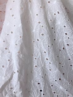 "Cotton eyelet fabric, off white color, boho bridal gown, doll dress, girl dress ❤ Listing is for One yard. If you purchase more, you will get a uncut piece . ❤ Measuring is about 51.2\" (130cm) wide ❤ It can be used for wedding dress, lingerie, bra, dresses, dolls, bridal veil, altered art, couture, costume, jewelry design, pillowcase, home decor and much more! ❤ More fabrics: https://www.etsy.com/shop/prettylaceshop?section_id=14206597 For more quantity, please feel free to convo me for custom Embroidery Couture, Eyelet Lace Fabric, Design Kurti, Boho Bridal Jewelry, Crochet Lace Collar, Bodice Applique, Beautiful Crafts, Boho Bridal Gowns, Eyelet Fabric