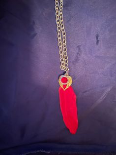 Relive all the fun and magic of the hit Hero anime with this red feather necklace. Features a red feather charm paired with a large red crystal and accented with a gold tone angel wings charm. Securely strung on a light weight gold tone aluminum chain, approximately 20" in length. It is securely closed with a lobster claw clasp. Hero Anime, Feather Necklace, Red Feather, Feather Charms, Feather Necklaces, Red Crystals, Hawks, Character Outfits, Best Anime Shows