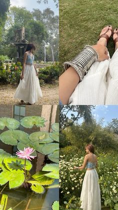 the woman is standing in front of some water lilies and holding onto her arm