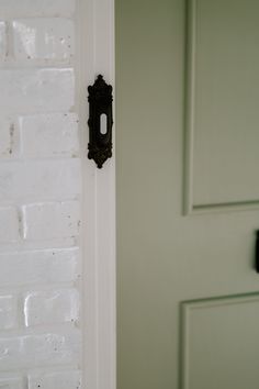 an open door with a black handle on it