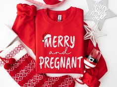 Tis the season for a baby bump! 🎅 Wear your holiday spirit (and belly) proudly with this merry and pregnant sweater!  UNISEX SIZING- Most customers feel the shirts fit TRUE TO SIZE, however, ladies should size down if they prefer a fitted look or if they have a petite body frame. PRODUCTION TIME: 1-3 days (Usually 2 days) SHIPPING TIME: 2-5 days (Usually 3 days) Product Features - Medium-heavy fabric  - Double-needle stitching for durability - Ribbed knit collar for shape retention - Ethically Pregnant Shirt, New Mom Shirt, Funny Pregnancy, Christmas Pregnancy Announcement, Christmas Pregnancy, Fun Life, Baby Announcements, Maternity Tees, Pregnancy Humor