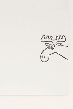 a drawing of a moose's head is shown in black ink on white paper