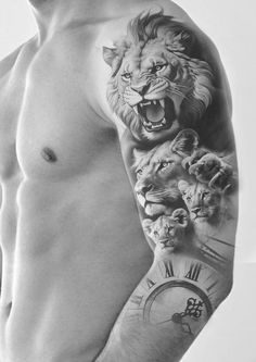 a man with tattoos on his arm and chest is holding a clock in front of him