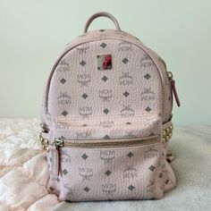 Authentic Mcm Backpack In Soft Pink (Size Small) Stark Side Studs Backpack In Visetos Approximately 5.1x10.2x13.0 Inches Leather Top Handle Mcm Logo Plate Front Zip Pocket Side Pockets With Studded Embellishments Two-Way Zip Around Closure Interior Pocket ** Has Small Easily Removable Stains On The Back Of The Straps** It Only Comes With The Bag Retails At $1,190. It Is Being Sold For Only $980. #Mcm #Mcmbackpack #Pinkbag Pink Mcm Backpack, Mcm Backpack, Studded Backpack, Mcm Handbags, Mcm Bags, Baby Pink Colour, Mcm Logo, Pink Backpack, Pink Bag