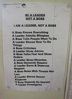 a sign that is on the side of a door saying to be a leader not a boss