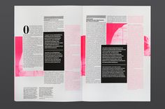 an open magazine with pink and black text on the front cover, inside pages spread out