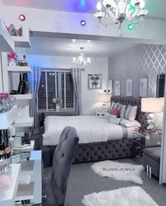 the bedroom is decorated in gray and white