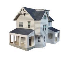 a model house is shown with the roof and windows painted white, while the second one has black shingles on it's sides