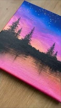 an acrylic painting of trees on a wooden surface with stars in the sky