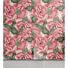 a pink flowered wallpaper with green leaves and flowers on the bottom half of it