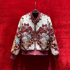 French Vintage Jacquard baseball Jacket, 3D Floral Embellished Jacket, Designer Streetwear beaded Jacket, Embroidery Rhinestone Applique Coat High-end custom collectible jacket coat. Custom Art Jacquard Fabric.Noble retro, Italian aesthetics, exquisite jacquard. The flower pattern comes from the European royal family,abstract intricate texture,the beautiful design is elegant and noble. The cloth surface is rich in style, the yarn color is varied and layered, and the visual effect is three-dimensional. Jacquard fabrics cost more than traditional fabrics,the craftsmanship is more complex, the quality and breathability are better, and it is more noble and retro. The most important is its unique style, the surface pattern presents a gradual and undulating shape, as delicate as a relief artwork Fall Outerwear With Embroidered Graphics And Long Sleeves, Fall Long Sleeve Outerwear With Embroidered Graphics, Embellished Long Sleeve Outerwear For Fall, Winter Outerwear With Floral Embroidery And Stand Collar, Spring Outerwear With Floral Embroidery And Stand Collar, Floral Embroidered Stand Collar Outerwear For Spring, Spring Varsity Jacket With Stand Collar, Spring Varsity Jacket With Embroidered Graphics, Winter Embellished Long Sleeve Outerwear