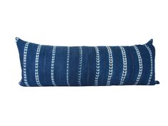 a blue and white striped pillow on a white background