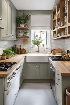 a kitchen filled with lots of counter top space and wooden shelves next to a stove top oven