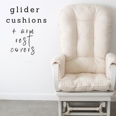 a chair sitting in front of a wall with the words glider cushions written on it