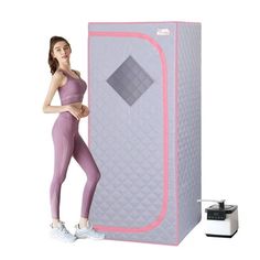 a woman standing next to an inflatable mattress