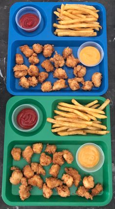 two trays filled with different types of food