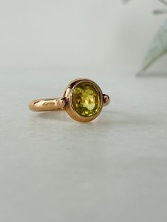 This faceted oval greenish yellow Tibetan citrine ring exudes a casual elegance. With it's bold design wear it solo or layer with others for a subtle, yet regal sophistication. Citrine is the stone of Abundance. It is best used when it comes in constant contact with the skin. Citrine 8x7mm 9K rose gold Size available 18 Please contact us for sizing options Please contact us for availability Follow us on Instagram: https://www.instagram.com/missionewyork/ Oval Green Citrine Rings, Yellow Ring, Constant Contact, Yellow Rings, Ring Stacking, Citrine Ring, Bold Design, Casual Elegance, Cocktail Ring