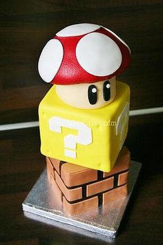 a cake made to look like mario mushroom