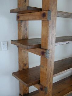 the shelves are made out of wooden boards