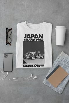 Keywords: UNISEX Suzuka Grand Prix T-Shirt, Japan Race Sweatshirt, Moto GP Hoodie,Japan Vintage Race Shirt, Motosport Sweater, Racing Tee, Moto GP Top Japanese Poster Top  ------------------------------------------------ QUALITY This T-shirt is a UNISEX t-shirt with a vintage illustration and it feels soft and light, with just the right amount of stretch. It features a crew neck, pre-shrunk fabric and side-seamed fit. FIND YOUR SIZE Please find the fitting guide in the pictures to determine your size. Pro Tip: Choose the best size by comparing the measurements of your favorite T-Shirt with the ones listed on the chart. SHIPPING We work with a reliable, high-quality print-on-demand partner with locations in US and the EU, so depending on the destination your orders are shipped from the faci White Letter Print T-shirt For Motorsport Events, White T-shirt With Motorsport Letter Print, Casual White Tops For Motorsport Events, F1 Hoodie, Ferrari Shirt, Japan Grand Prix, Motorsport Clothing, F1 Shirt, Retro Japan