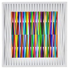 an abstract painting with multicolored lines in white frame