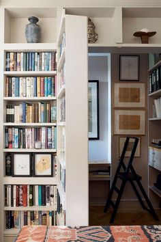 an open book shelf filled with lots of books