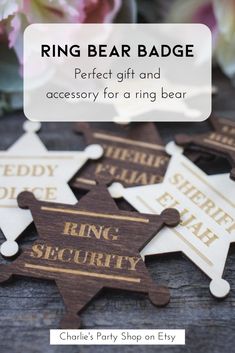 some wooden signs that say ring bear badge and the words perfect gift and accessory for a ring bear