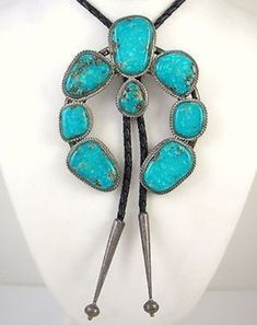 What a statement piece! A large natural Turquoise Naja Bolo, Native American-made with sterling tips. Southwest Fashion, Turquoise Bolo Tie, Silversmith Jewellery, Bolo Ties, American Indian Jewelry, Navajo Jewelry, Native Jewelry, Squash Blossom, Coral Jewelry