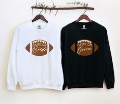 Bride & Groom Football Couple Retro Shirt, Future Wife Husband Football Player Matching Sweatshirt, Bridal Shower Tee Are you in search of the ultimate gift for a soon-to-be bride or groom? Your search ends here! It features trendy bride and groom shirts cozy crewnecks, perfect for the future wife and husband. Whether you need a bride-to-groom gift, a camping-themed tee, or a charming marriage present for newlyweds, we have it all. Enhance the magic of your or their special day with our stylish Football Themed Wedding Shower Ideas, Couples Wedding Shower Football Theme, Bride And Groom Sweatshirts, Football Wife Shirt, Football Couple, Married Couple Shirts Mrs. Bridal Shop, Football Couples, Groom Shirts, Trendy Bride