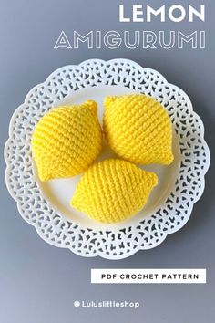 two crocheted lemons on a white plate with the words lemon amigurmi