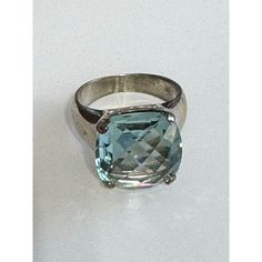 Pictured is a Swarovski Caribbean Blue Faceted Roundish Crystal Statement Cocktail Ring This size 9 ring sides are 8mm and has a 15mm crystal. Signed with Swarovski hallmark and weighs 7.7 grams. ** Some of the silver plated has worn from the prongs and some from sides on the ring. Size: 9 Condition: Pre-Owned  ** Some of the silver plated has worn from the prongs and some from sides on the ring. Classic Blue Round Crystal Ring, Luxury Blue Crystal Sterling Silver Ring, Luxury Iridescent Cabochon Rings, Nickel-free Blue Crystal Ring, Aquamarine Crystal Ring With Accent Stones, Gift, Caribbean Blue, Cocktail Ring, Cocktail Rings, Rings Statement