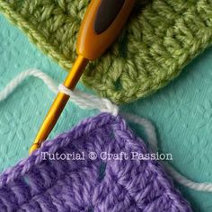 two crocheted grannys are next to each other with a knitting needle in the middle