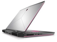 an open laptop computer sitting on top of a white surface with pink trimmings