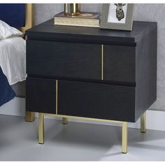 a night stand with two drawers on one side and a framed photograph on the other