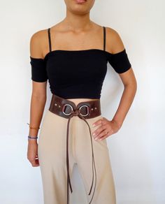 "Leather thickness: 2.0- 3.0 mm (0.08- 0.12\")  Width: 3.14in/ 8 cm Handmade  wide leather belt available made from full grain leather. A woman's leather belt that pairs perfeclty with your jeans and dresses. All our belts are produced with leather that comes from the island of Crete  and it is famous for it's superior quality and uniqueness.  This one is a leather belt that goes really well with a lot of clothes. It gives something extra for the look that you are going for.   The packages are sent through the Hellenic Postal System registered by A' Priority. We are located in Greece and most items are delivered within 7-14 business days. It will also make a perfect gift for friends, designers, writers on Birthday, Anniversary, Valentine's Day, Christmas, Graduation, Holidays, Wedding Favo Chunky Accessories, Cowgirl Belts, Western Bohemian, Plus Size Belts, Handmade Leather Belt, Womens Leather Belt, Boho Belts, Belt Women, Wide Leather Belt