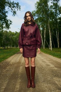 There are some looks from the 80s and 90s we’re happy to leave in the past, but this exaggerated bomber jacket with feminine puff sleeves, long elastic cuffs, and a tie belt with trapunto stitch detailing isn’t one of them. Pictured here in Merlot, our new Chazz jacket looks contemporary and chic paired with our matching Vallie skirt. -Hidden zipper front placket-Drop shoulder with trapunto stitch waist tie belt-Pleated cuff detail-100% polyester-Fully lined-Care instructions: spot clean only Winter Outerwear With Blouson Long Sleeves, Fall Outerwear With Blouson Long Sleeves, Fall Outerwear With Blouson Sleeves And Long Sleeve, Fitted Outerwear With Belted Cuffs For Fall, Fitted Fall Outerwear With Belted Cuffs, Chic Winter Outerwear With Puff Sleeves, Chic Puff Sleeve Winter Outerwear, Chic Puff Sleeve Outerwear For Winter, Fall Collared Outerwear With Belted Cuffs