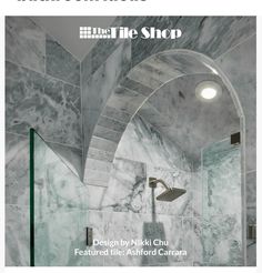 the front cover of an architectural magazine with marbled walls and flooring in grey tones