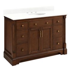 a bathroom vanity with white counter top and wooden cabinetry on the bottom, against a white background