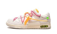 The Off-White x Nike Dunk Low “Lot 17” is one of multiple colorways of the classic low-top shoe created by Virgil Abloh in collaboration with Nike in August 2021.  A monumental collection that spans 50 unique colorways of the retro basketball shoe, the Off-White and Nike “Lot 50” line succeeds Abloh’s influential “The 10” collaboration with Nike from 2017.  On “Lot 17,” Sail canvas appears on the toe, mid-panel and collar.  The overlays and Swoosh are constructed in Neutral Grey leather.  Black “Nike” branding is printed on the heel and Off-White’s signature Helvetica text is found on the medial side.  A secondary, bungee cord-like lacing system is added to the upper in addition to a traditional lacing setup.  The look is carried over from Off-White’s first Nike Dunk collaboration from 201 Dunk Low Off White, Nike Dunk Low Off White, Off White Dunk, Nike X Travis Scott, Off White X Nike, Retro Basketball Shoes, Limited Edition Sneakers, Nike Brand, Nike Shox