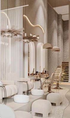 the interior of a modern salon with white furniture