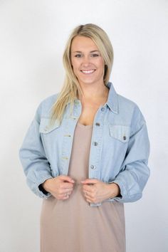 Light Wash Denim Puff Sleeve Crop Jacket This light wash denim puff sleeve crop jacket is the perfect sweet layering piece. Featuring a drop-shoulder and cinched waist, this easy denim jacket pairs adorably over a casual dress for an easy look. Oversized Fit 100% Cotton Machine Wash Cold, Line Dry Boutique Trends, Light Wash Denim, Cinched Waist, Crop Jacket, Layering Pieces, Oversized Fits, Drop Shoulder, Puff Sleeve, Casual Dress