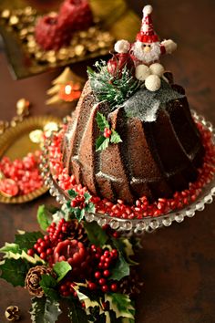 a christmas cake on a table with decorations