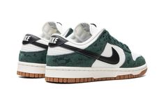 The Women’s Nike Dunk Low "Green Snake" is a women’s-exclusive colorway of the retro basketball shoe with reptilian accenting.  The “Green Snake” features a unique combination of smooth and textured panels, the latter of which are arranged in a scale-like texture on the shoe’s overlays.  The upper is complete with a white leather base and Pro Green overlays with the reptilian pattern.  A black leather Swoosh appears on each side.  “Nike” is embroidered on the heel and printed on the tongue tag w Dunks Black, Snake Shoes, Profile Silhouette, Nike Branding, Retro Basketball, Green Snake, Snake Pattern, Nike Sb Dunks Low, Nike Brand